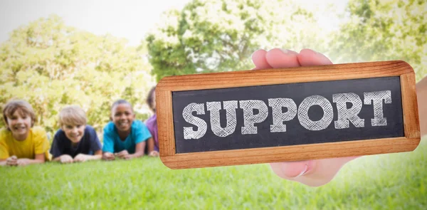 Word support and hand showing chalkboard — Stock Photo, Image