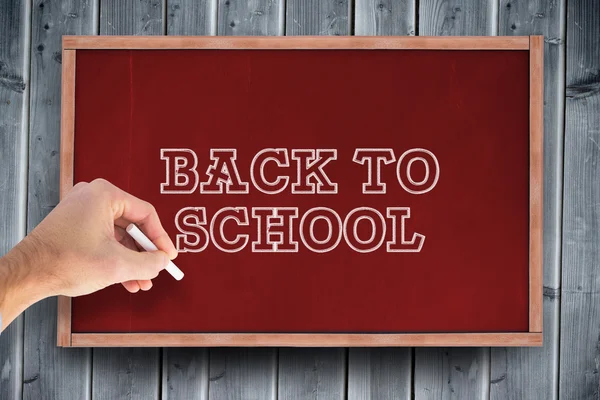 Composite image of hand writing with a white chalk — Stock Photo, Image