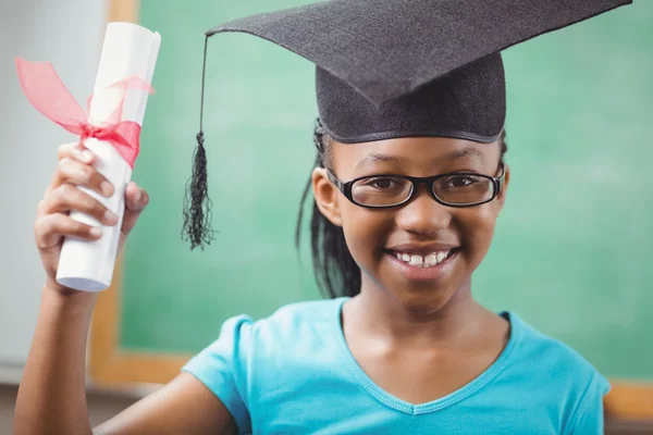 Pupil with mortar board and diploma — Stock Photo, Image