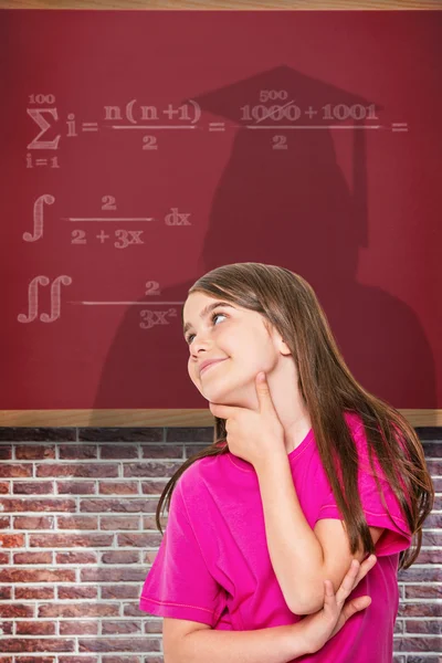 Cute little girl thinking and looking up — Stock Photo, Image