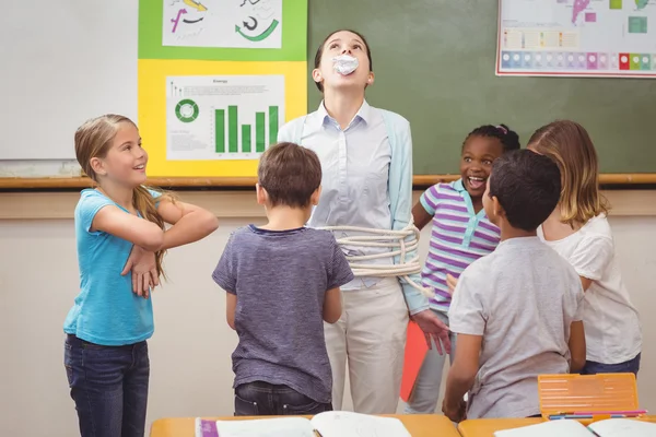 Pupils running wild in classroom — Stock Photo, Image