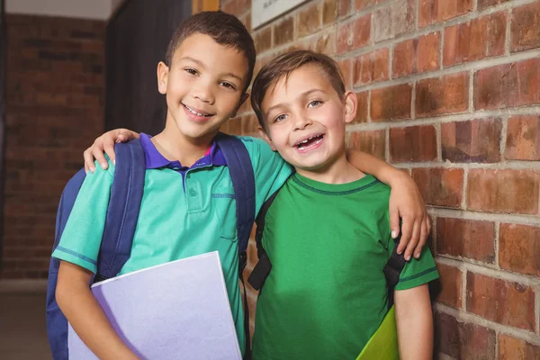 Smiling students looking at camera — Stock Photo, Image