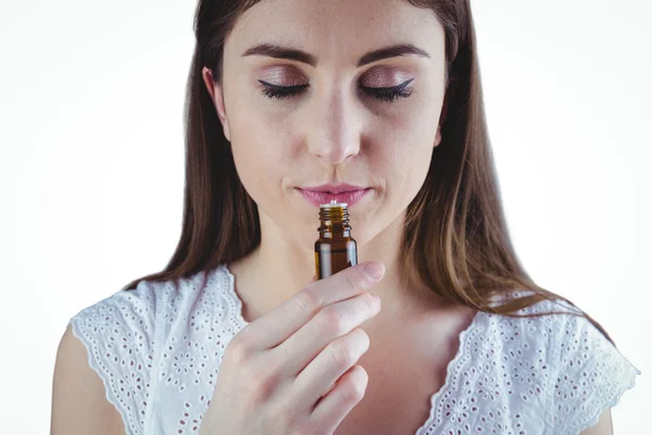 Woman taking alternative tincture — Stock Photo, Image