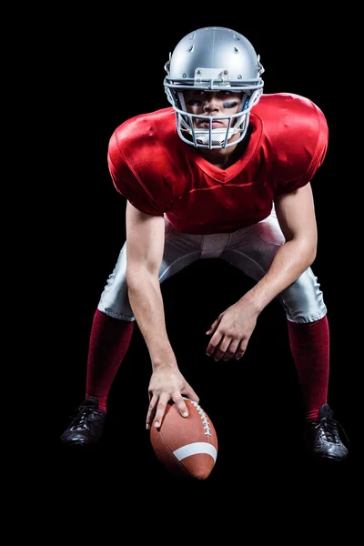 Jogador de futebol americano colocando bola — Fotografia de Stock