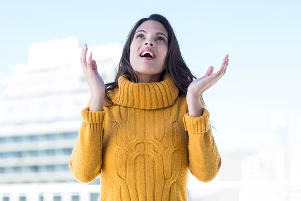 Surprised woman with hands out — Stock Photo, Image