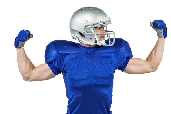 Hráč amerického fotbalu, protahuje svaly — Stock fotografie