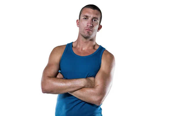 Serious athlete with arms crossed — Stock Photo, Image