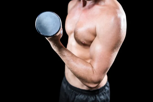 Sports player working out with dumbbell — Stock Photo, Image