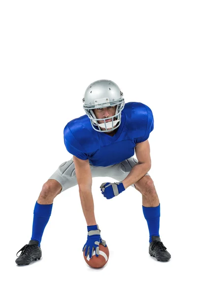 American football player in attack stance — Stock Photo, Image