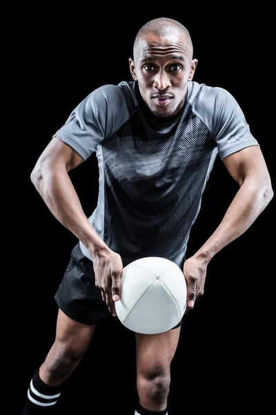 Jogador de rugby jogando bola — Fotografia de Stock