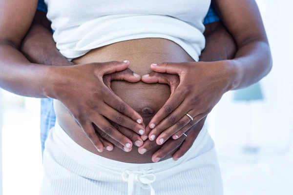 Man en vrouw hart vorm maken — Stockfoto