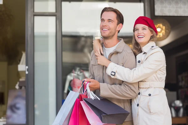 Couple with shopping bags — Stock Photo, Image