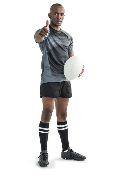 Jugador de rugby confiado mostrando pulgares hacia arriba — Foto de Stock