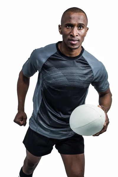 Athlet läuft mit Rugbyball — Stockfoto