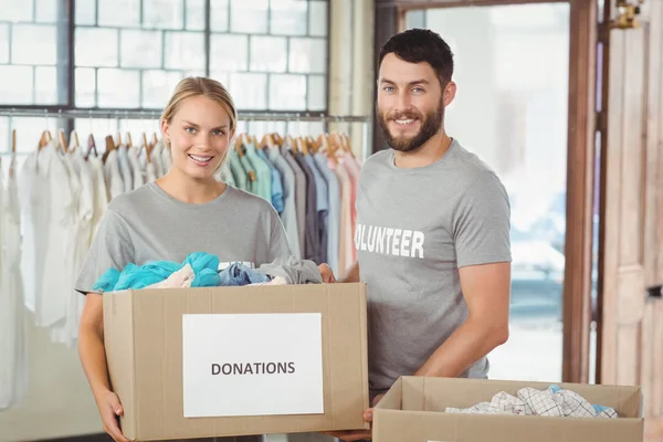 Woman holding donation box — Stock Photo, Image