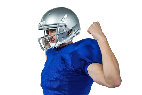 American football speler buigen spieren — Stockfoto