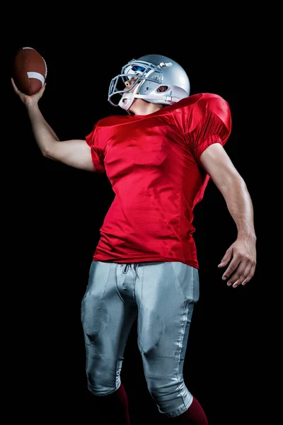 Amerikai labdarúgó holding ball — Stock Fotó