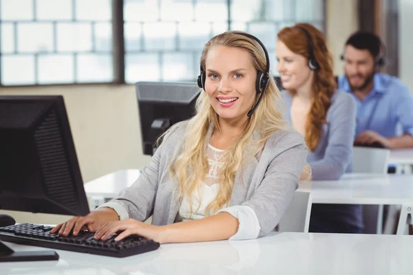 Operator working on computer in office — Stock Photo, Image