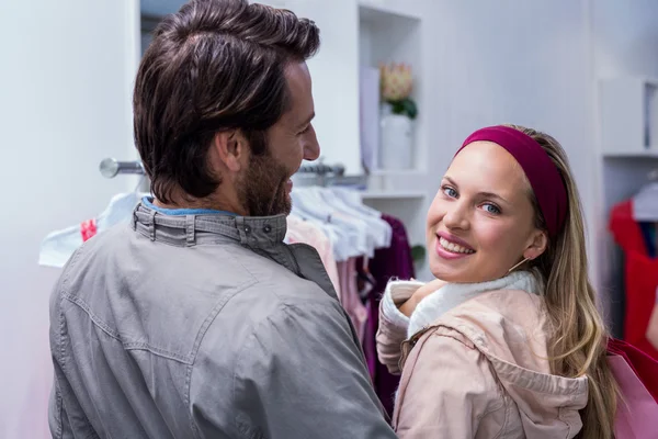 stock image man having arm around girlfriend