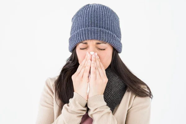 Sick brunette blowing her nose — Stock Photo, Image