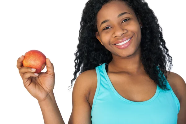 Modell som håller ett rött äpple — Stockfoto