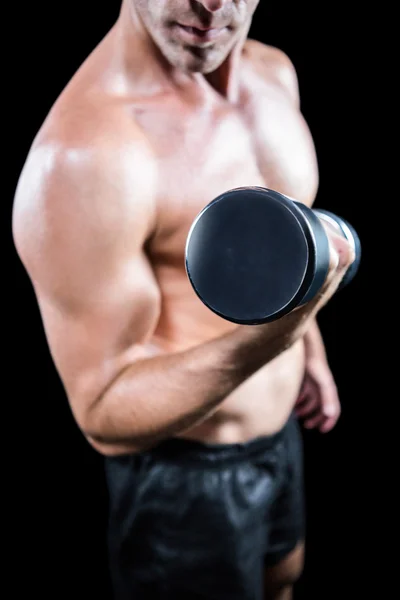 Shirtless man working out with dumbbell — Stock Photo, Image
