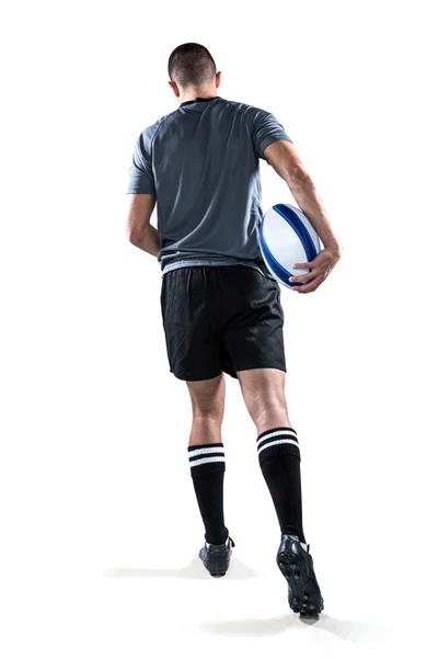 Topu ile çalışan rugby oyuncusu — Stok fotoğraf