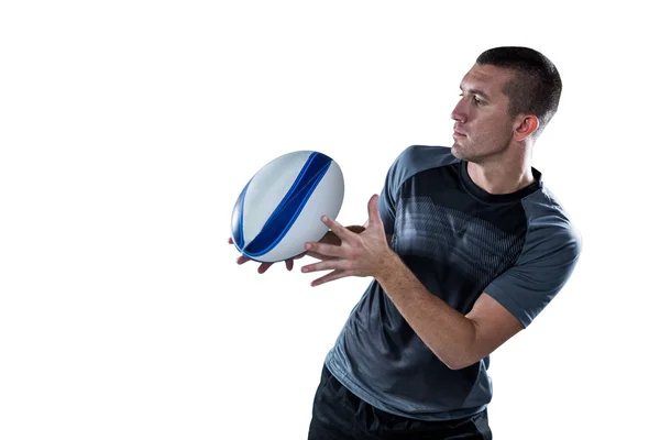 Спортивный игрок ловит мяч — стоковое фото