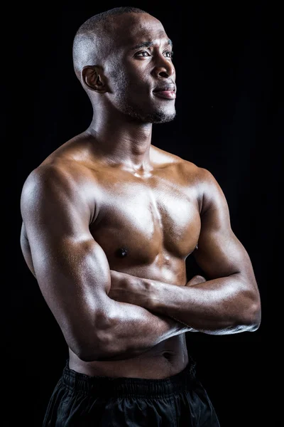 Athlete standing with arms crossed — Stock Photo, Image