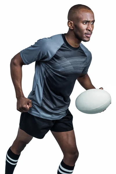 Deportista corriendo con pelota de rugby — Foto de Stock