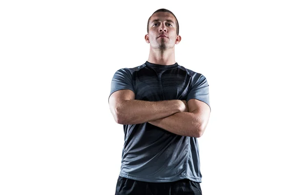 Confident rugby player with arms crossed — Stock Photo, Image