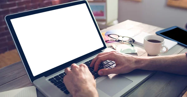 Designer using laptop in creative office — Stock Photo, Image