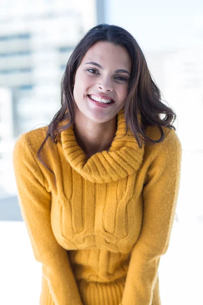 Happy brunette smiling at camera — Stock Photo, Image