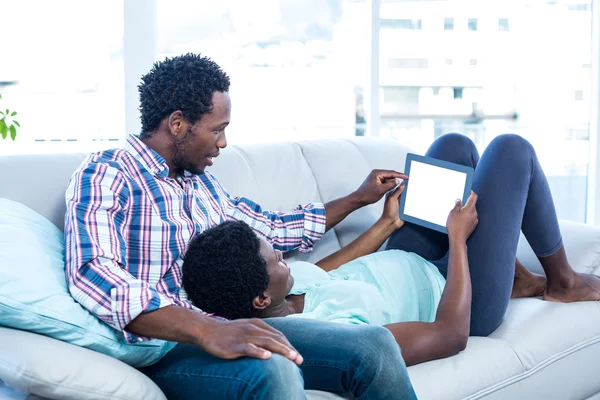 Couple looking at digital tablet — Stock Photo, Image