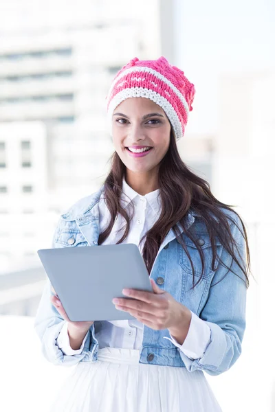 Pretty woman using her tablet pc — Stock Photo, Image