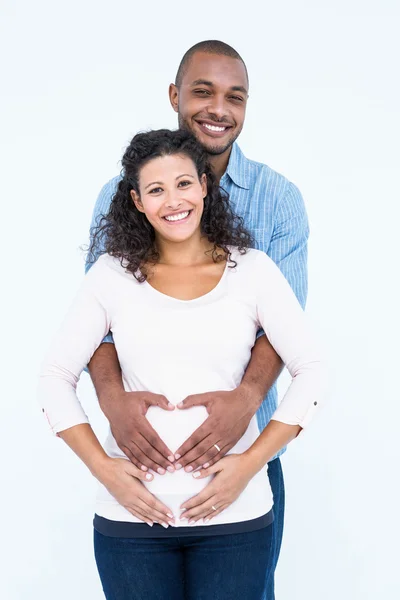 Couple with hands on belly — Stock Photo, Image