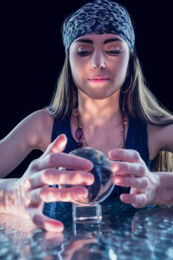 Fortune teller using crystal ball clipart