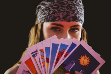Fortune teller using tarot cards clipart