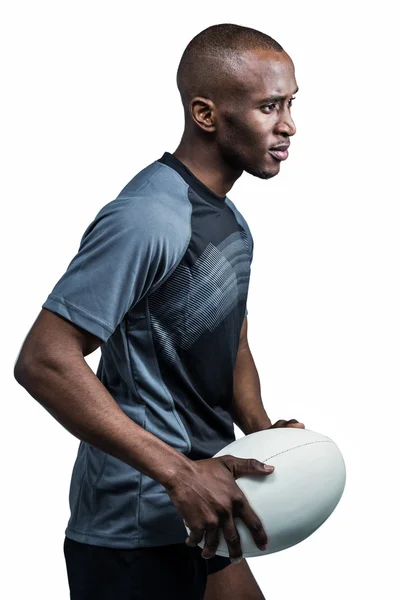 Confident sportsman with rugby ball — Stock Photo, Image