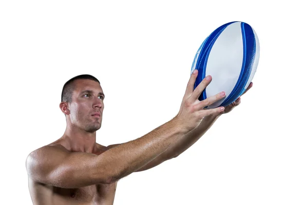 Jugador de rugby sin camisa sosteniendo pelota —  Fotos de Stock