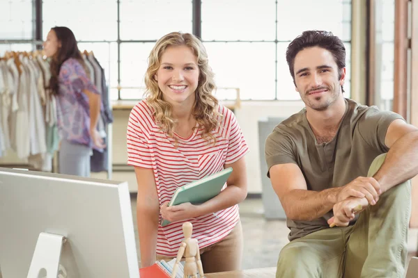 Happy fashion designers in office — Stock Photo, Image