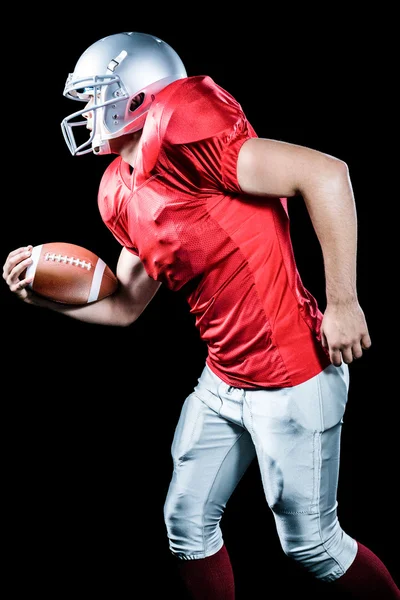 Sportsman playing American football — Stock Photo, Image