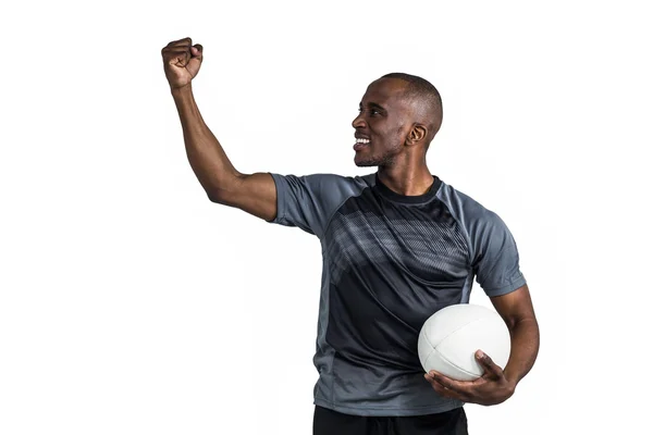 Sportsman holding rugby ball — Stock Photo, Image