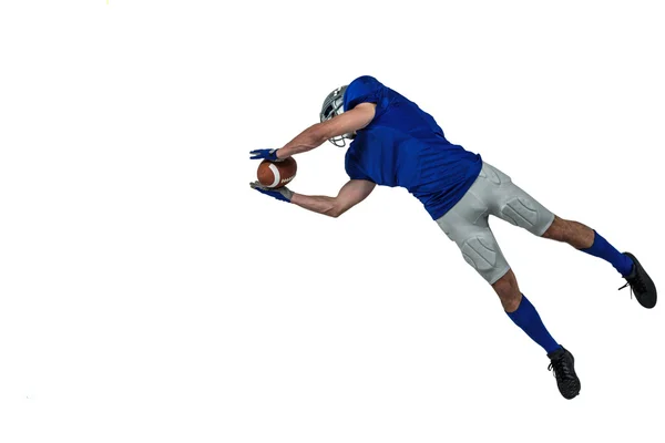 American football player catching ball — Stock Photo, Image