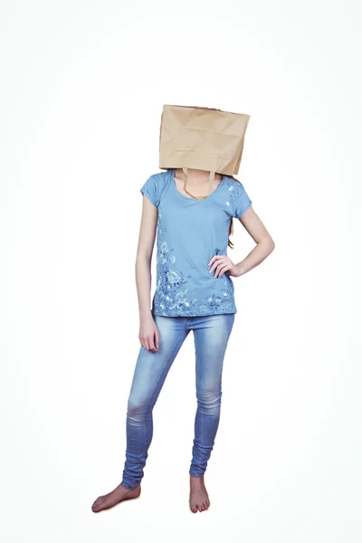 Woman posing with bag on head — Stock Photo, Image