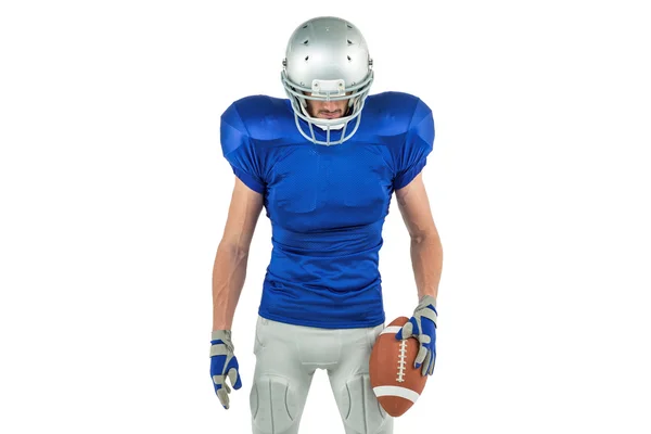 American football player looking down — Stock Photo, Image