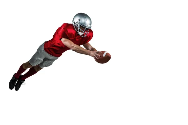 Jugador de fútbol americano anotando un touchdown —  Fotos de Stock