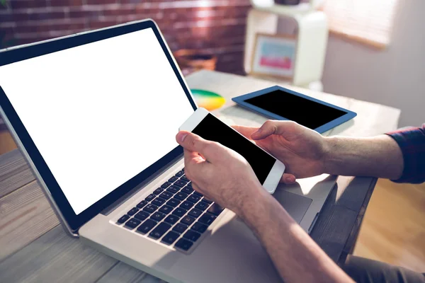 Graphic designer using smartphone — Stock Photo, Image