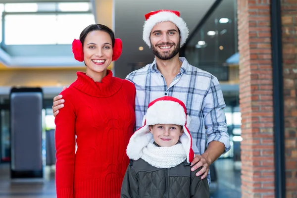 Happy family in shopping mall — Stock Photo, Image