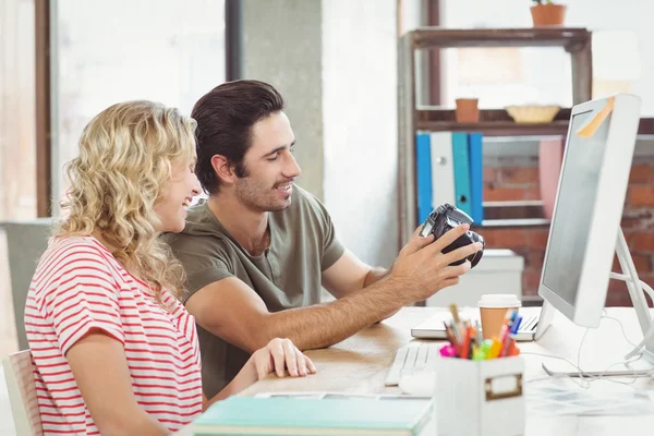 Man and woman looking at camera — Stock Photo, Image